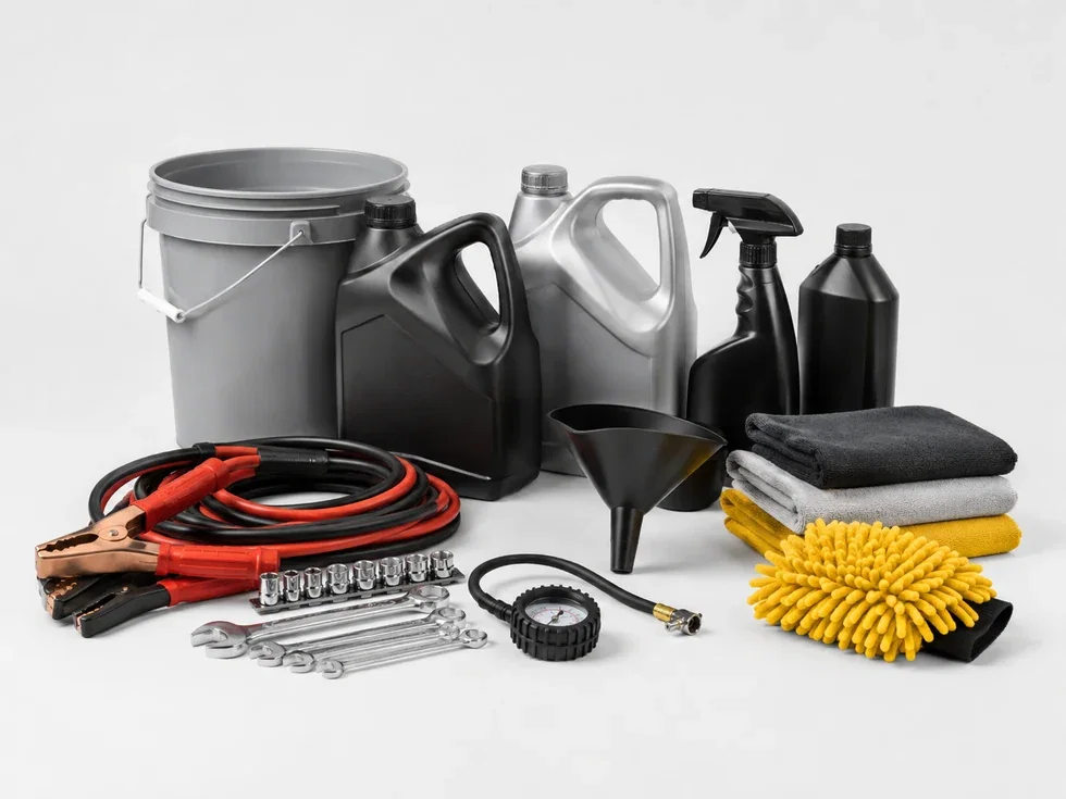 Automotive maintenance products including oil bottles, jumper cables, wrenches, funnel, microfiber towels, tire gauge, bucket, and wash mitt.